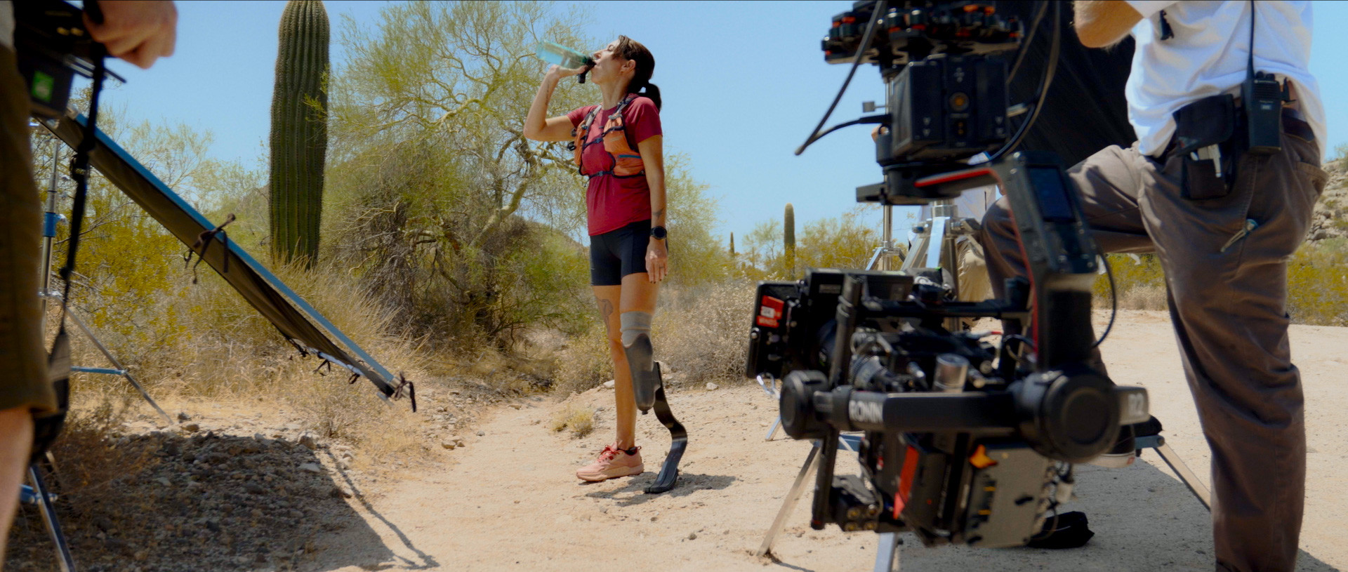 woman being filmed in the desert