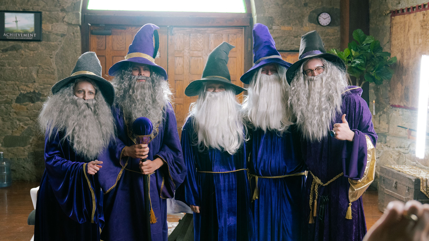  Five actors dressed as wizards