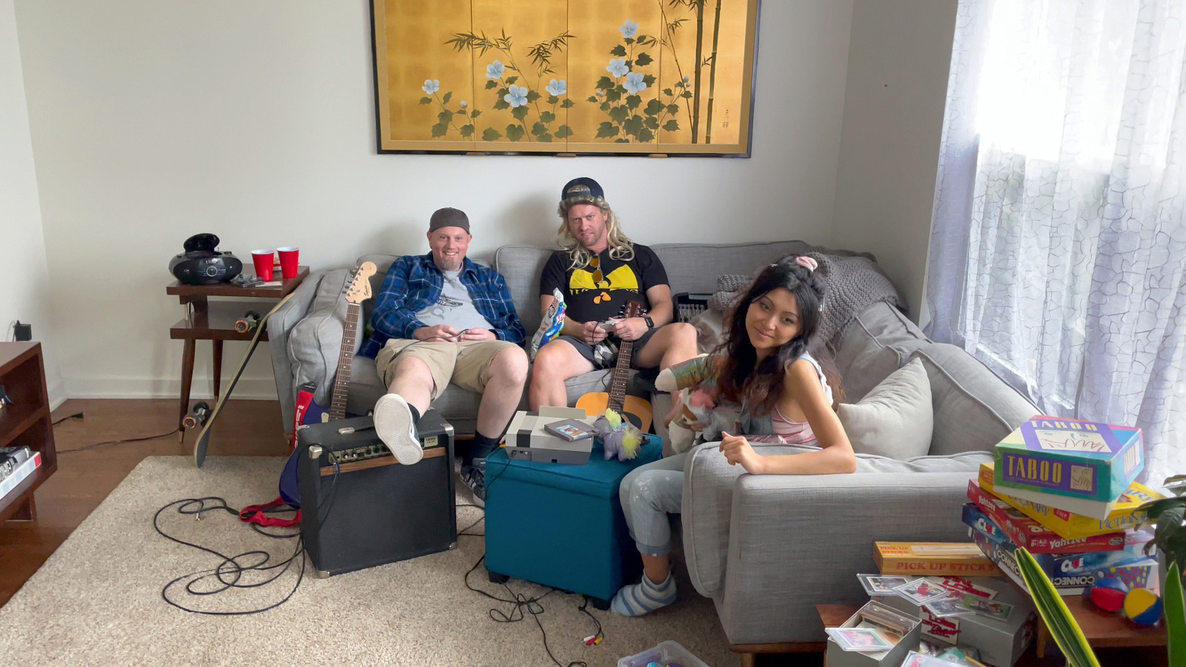 Three team members sitting on a couch together
